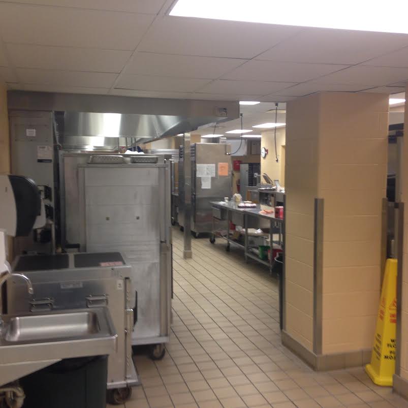 Behind where food is served to students
