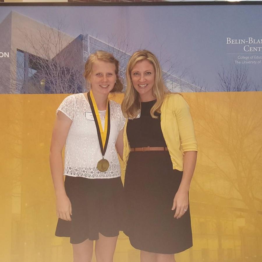Emily Larson, left, poses with Mrs. Torman, right, at the BESTS ceremony